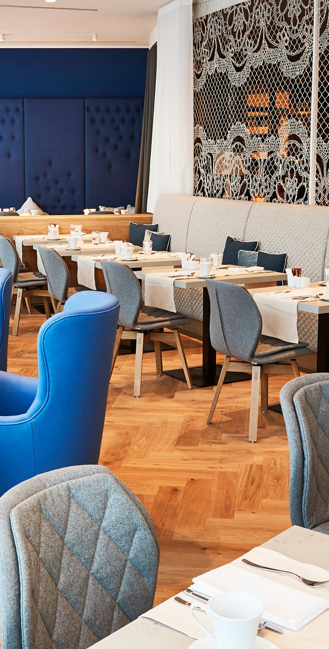 Modern restaurant with blue seating decor