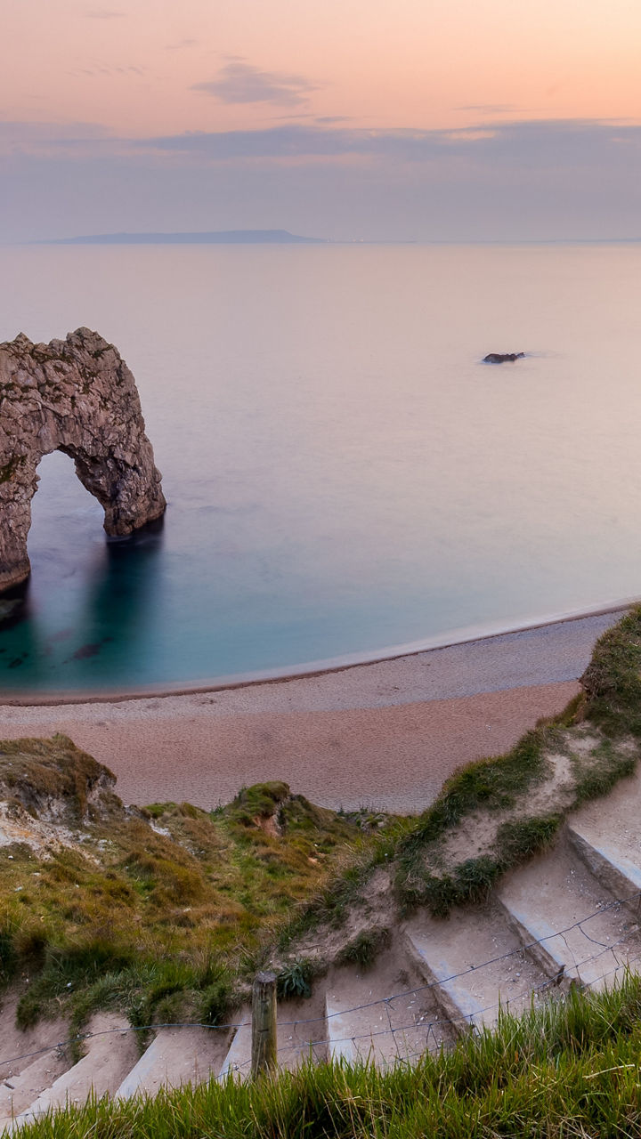 Durdle Door at sunset with coastal view