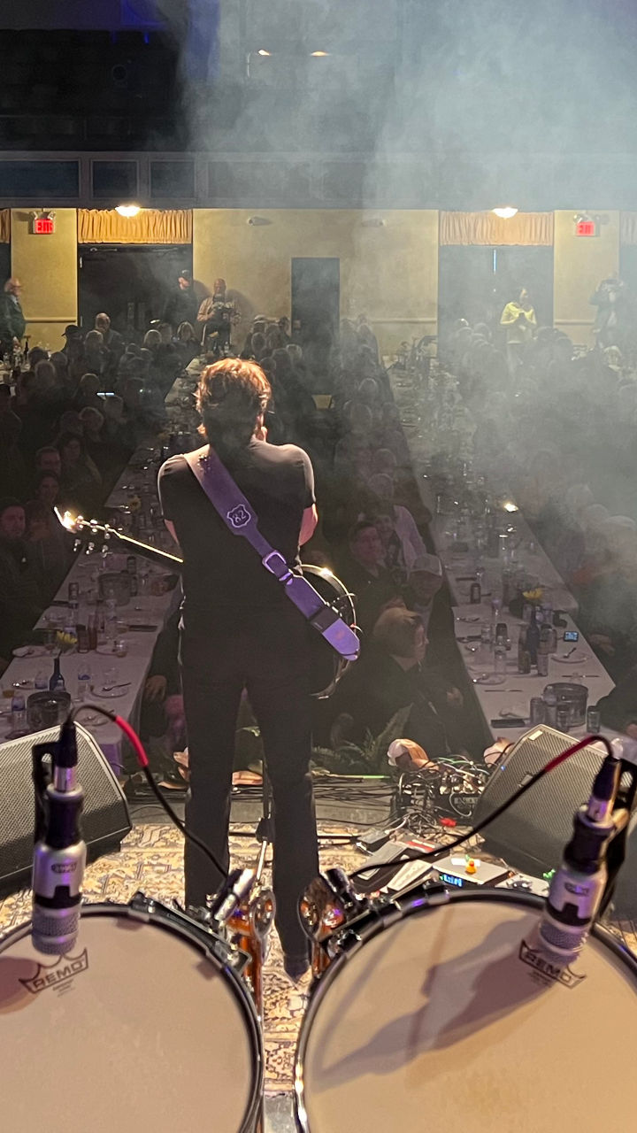 Live concert with musician and drum set