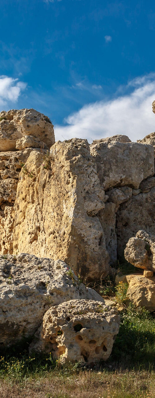 Ancient stone ruins under blue sky