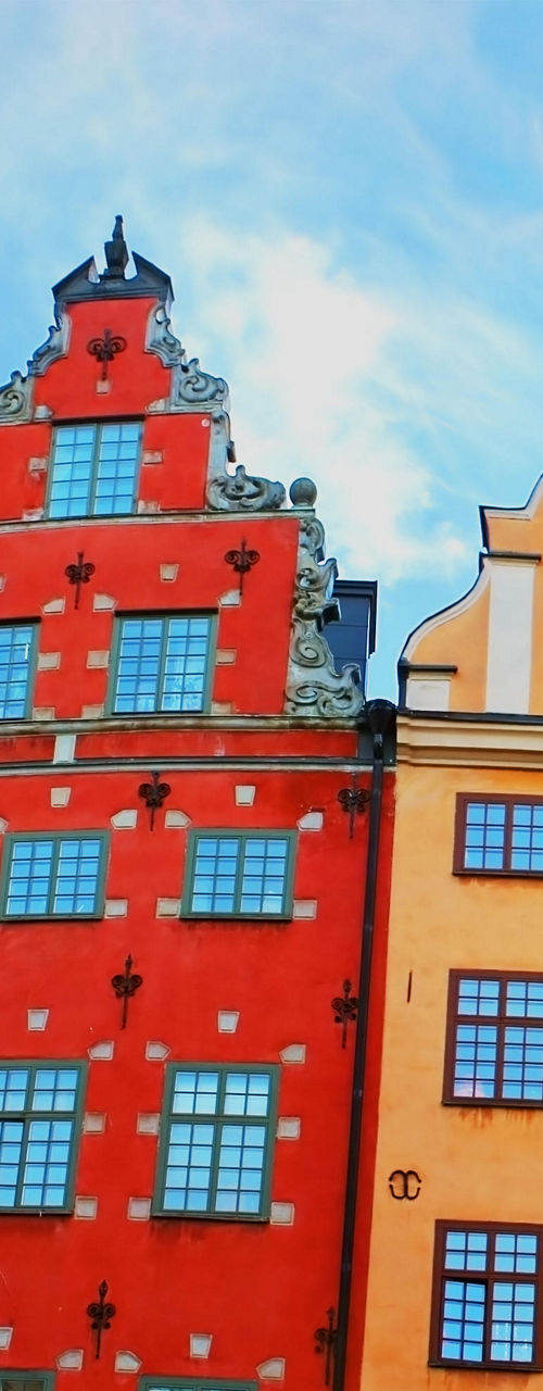 Colorful historic buildings under blue sky