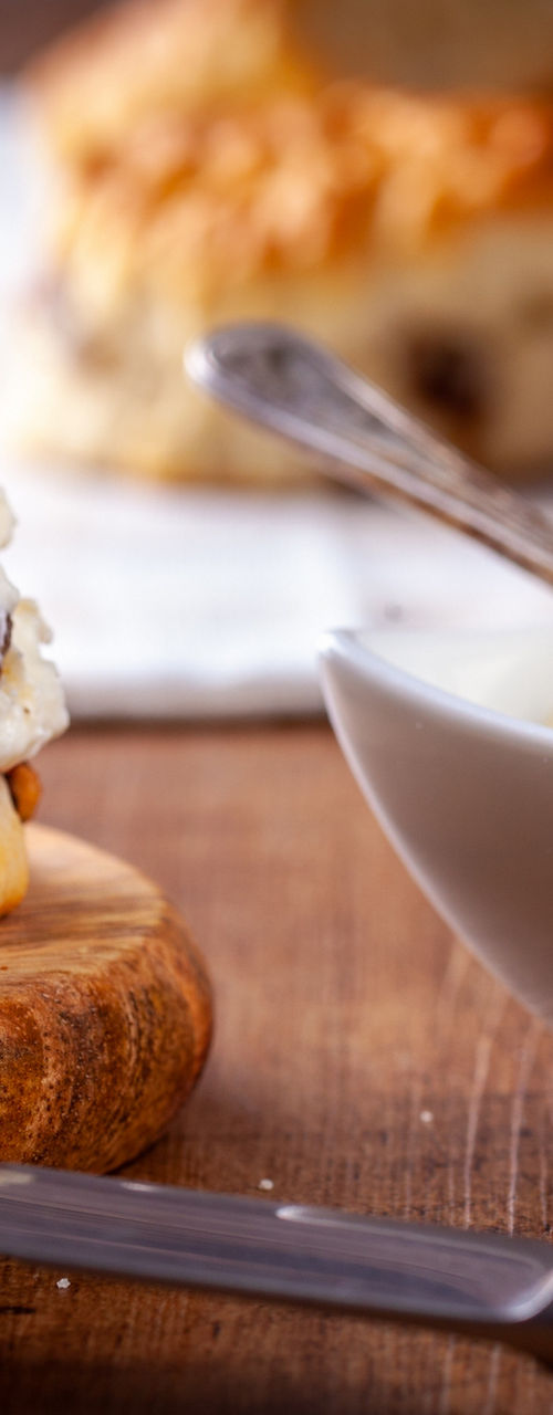 Scone with cream and strawberry jam