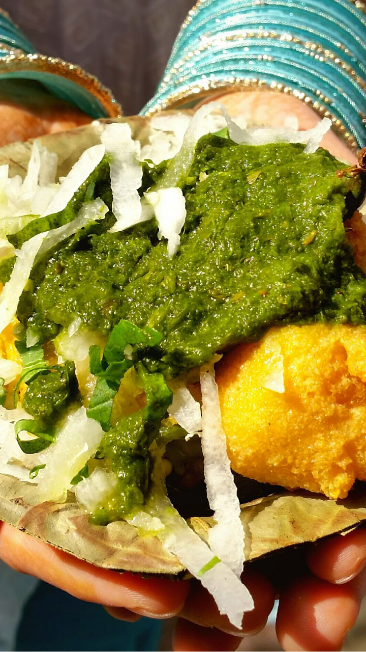 Street food served in leaf bowl
