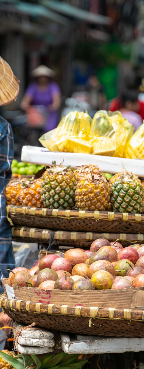 Street vendor selling tropical fruits