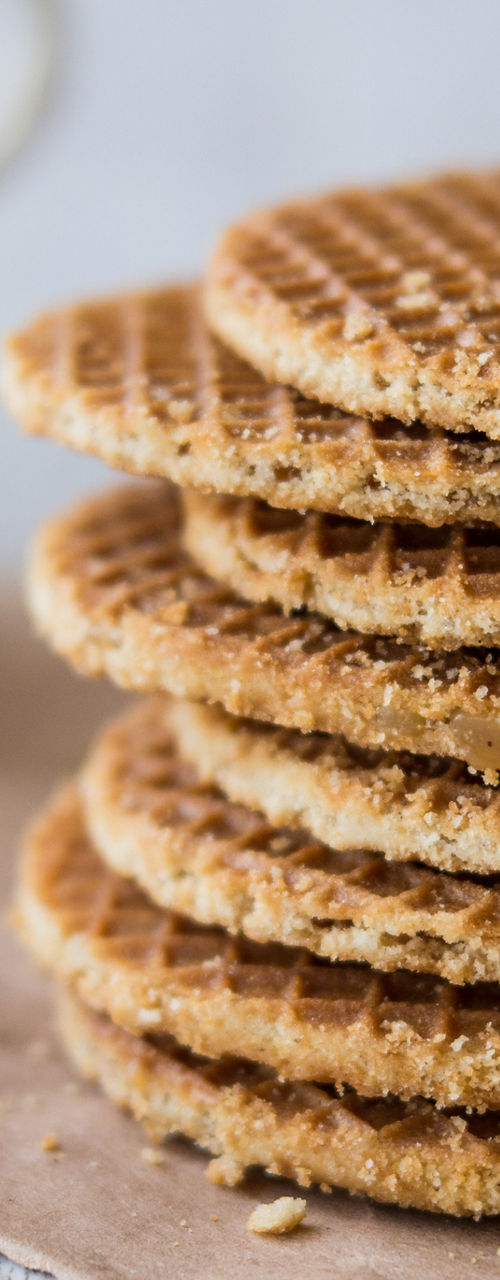 Stack of caramel waffles with tea