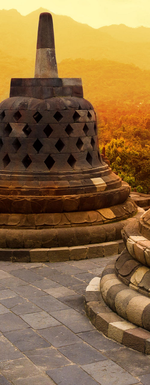 Borobudur temple stupas at sunset