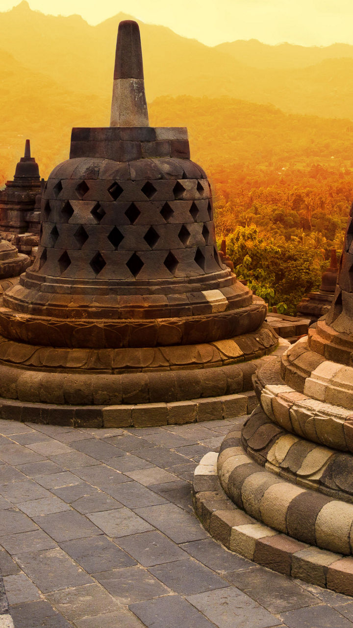 Borobudur temple stupas at sunset