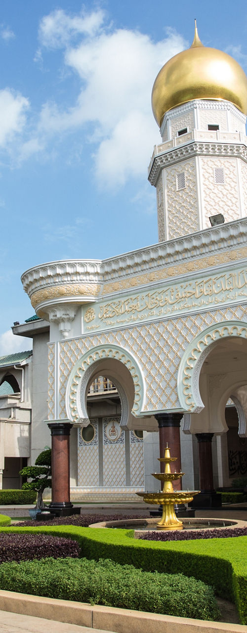 Elegant mosque with golden dome and arches