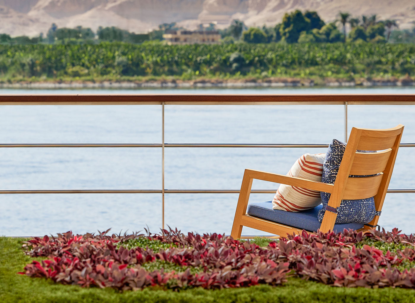 Scenic river view with wooden chair