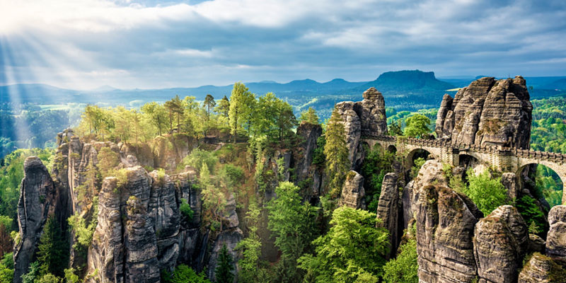 Scenic rock formations with historic bridge