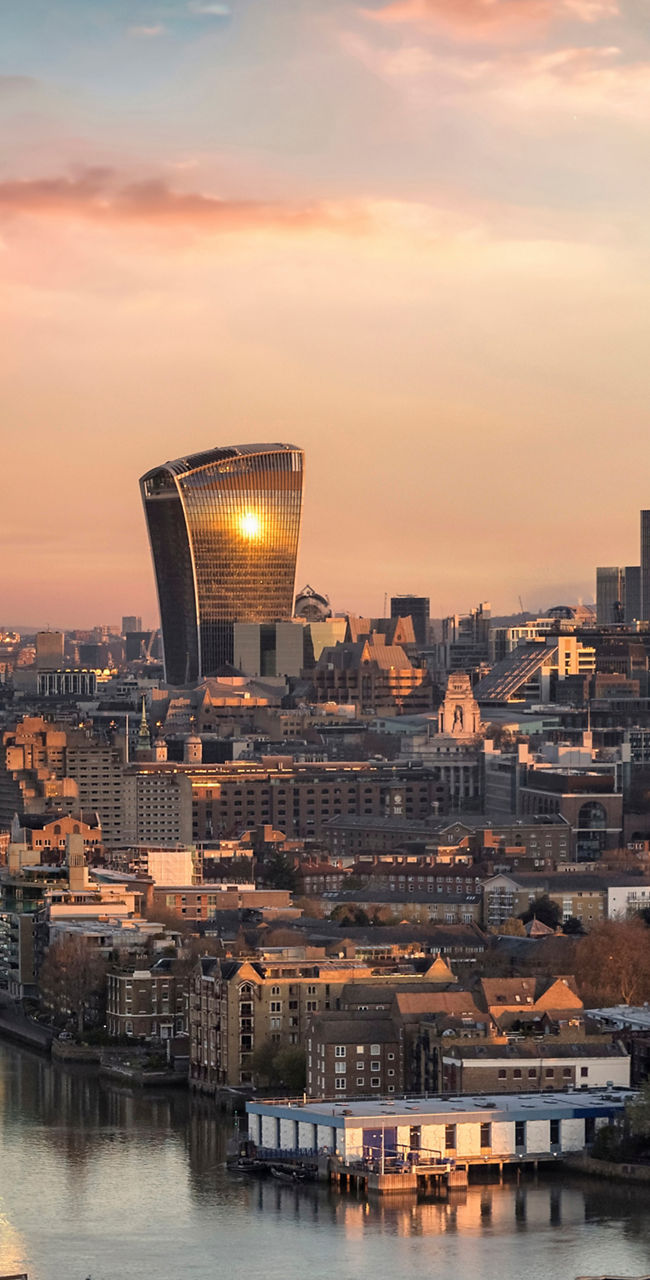 London skyline at sunset with iconic landmarks