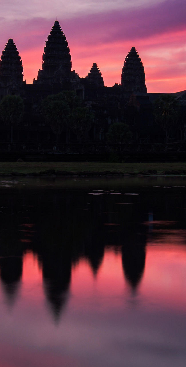 Angkor Wat at sunrise with reflection