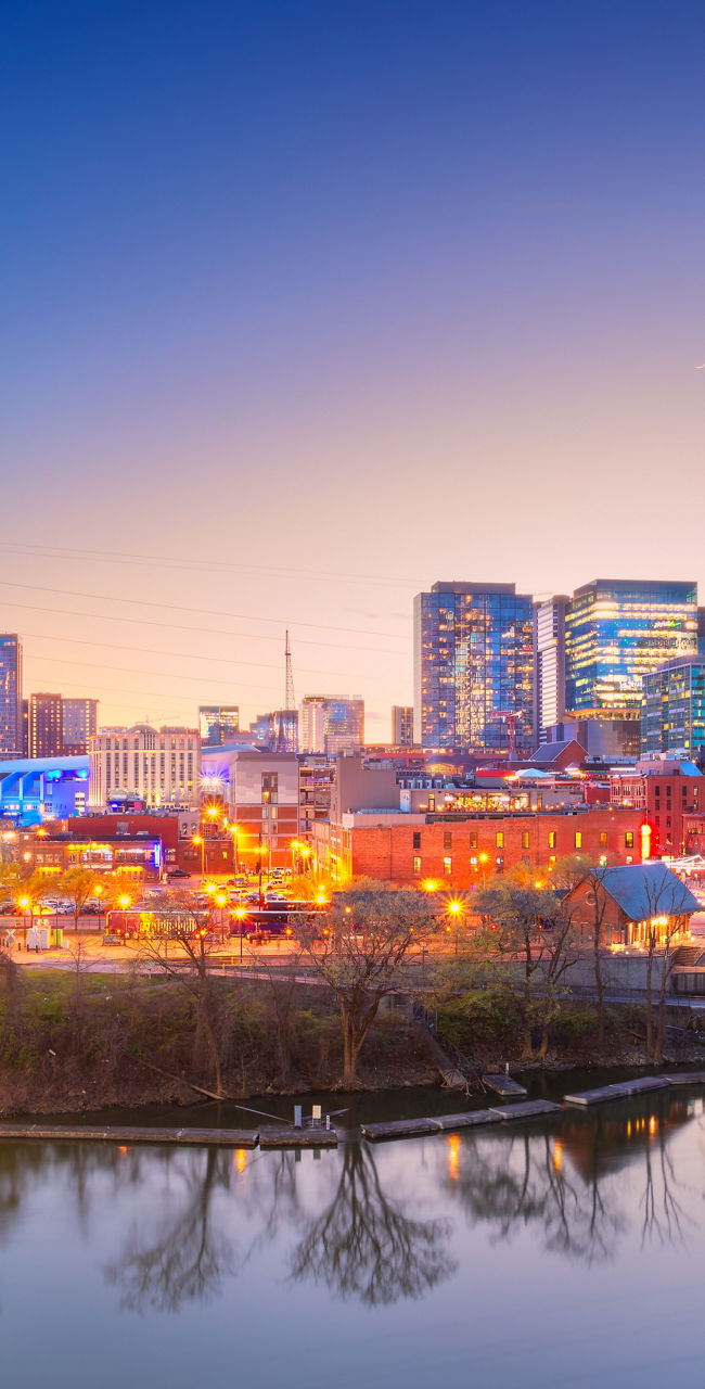 Nashville cityscape at sunset with bridge view