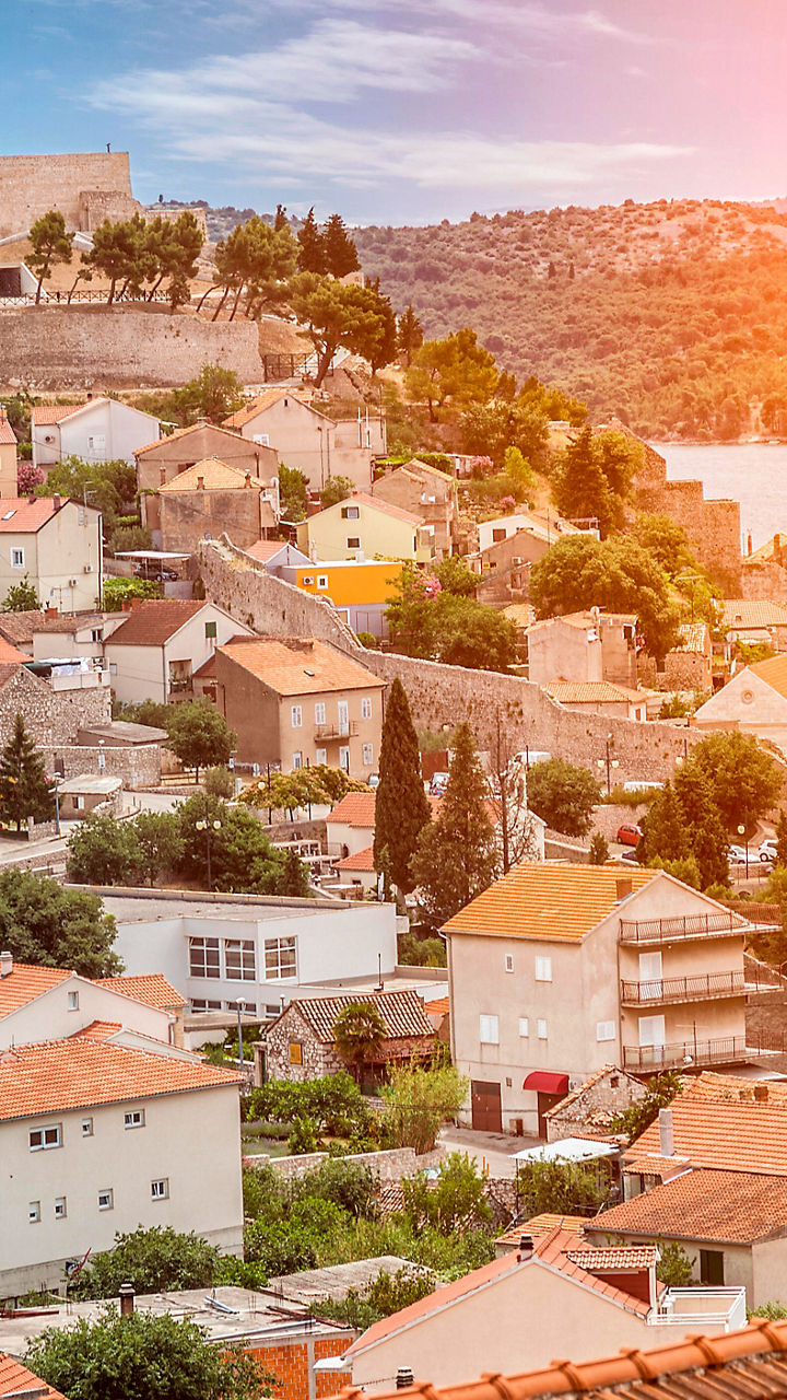 Scenic coastal town with historic fortress