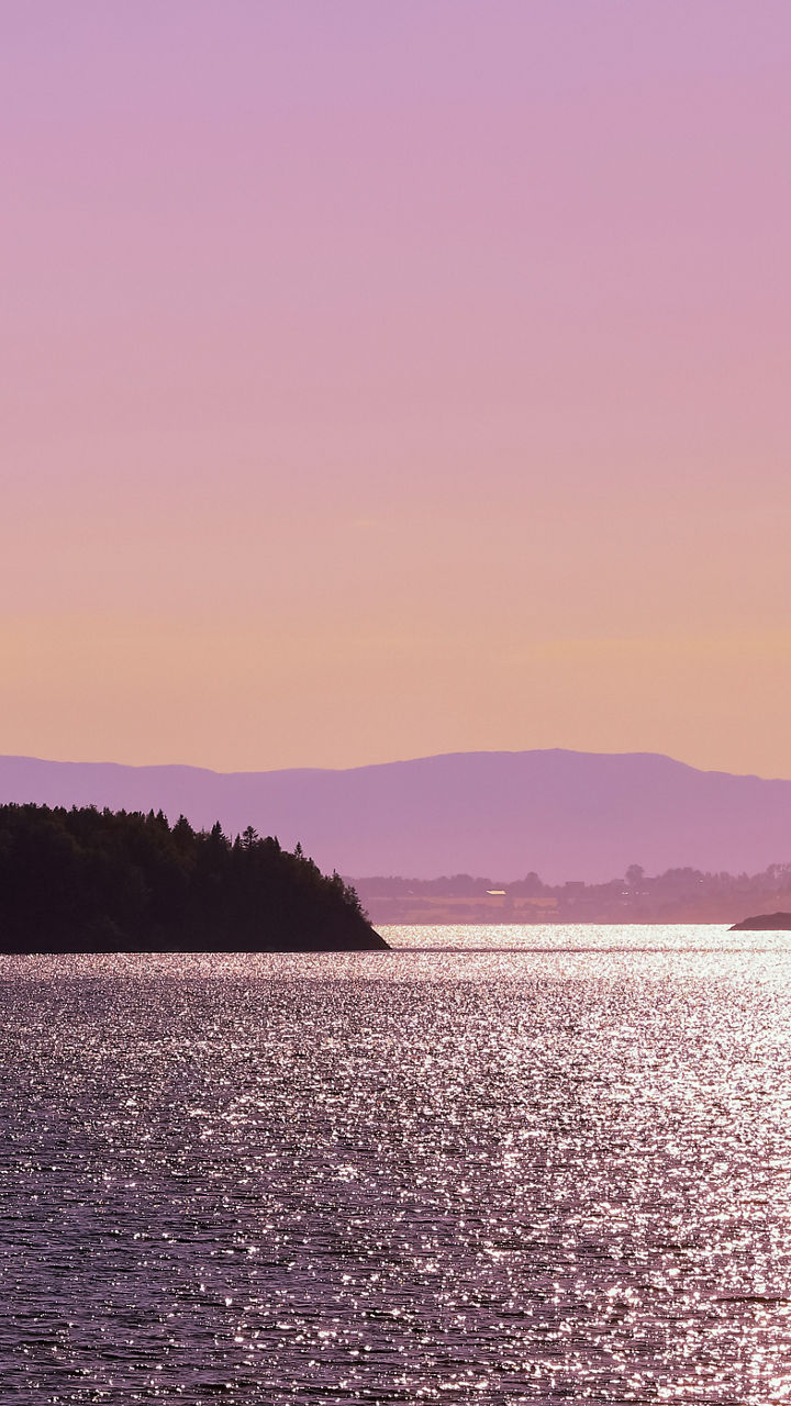 Serene sunset over calm ocean waters