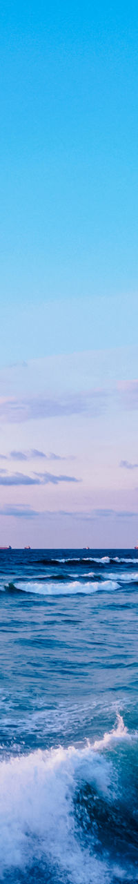 Hassan II Mosque by ocean at sunset