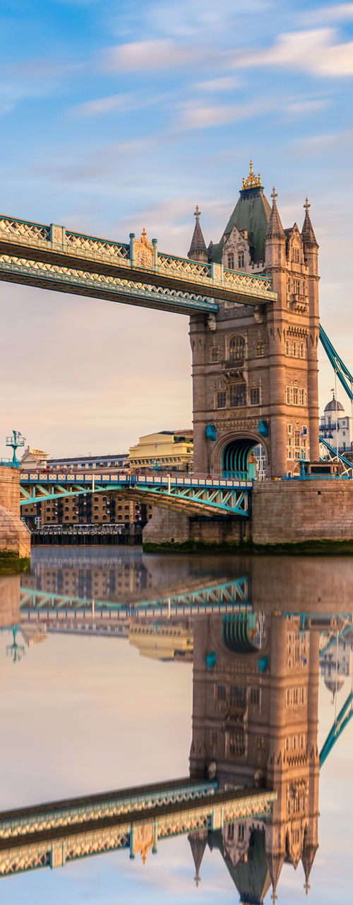 Tower Bridge reflecting in calm river waters