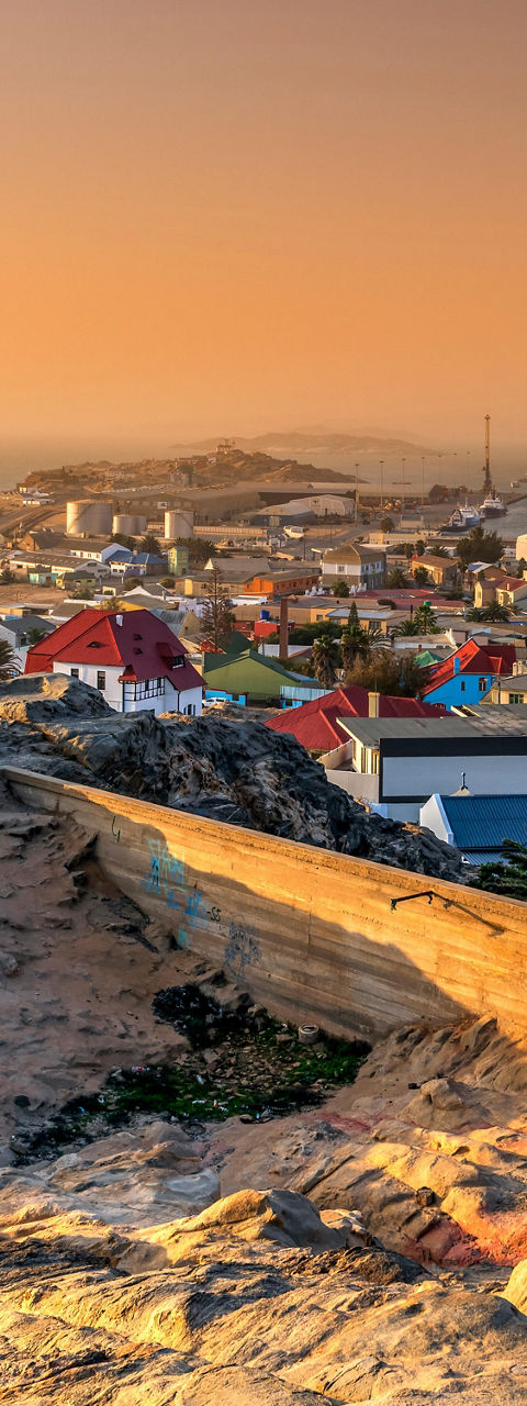Scenic coastal town at sunset with church