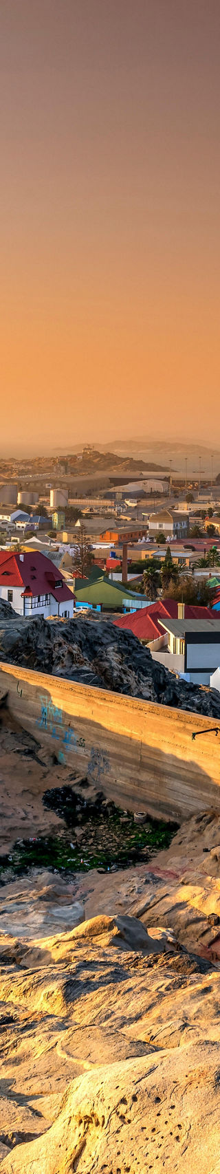 Scenic coastal town at sunset with church