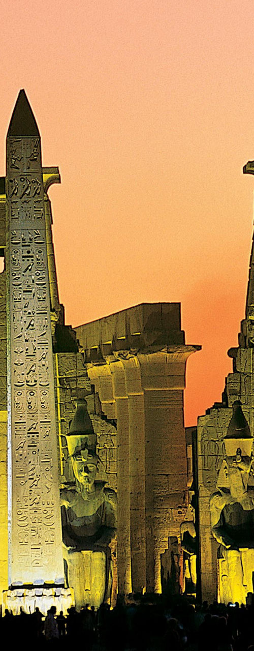 Luxor Temple at sunset with obelisk