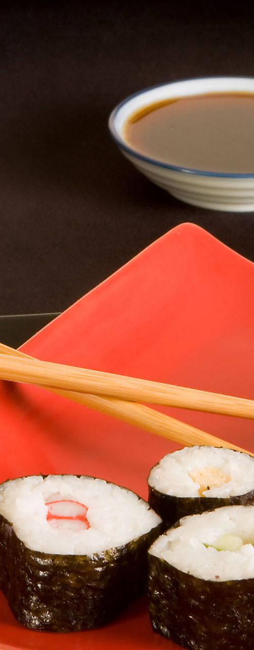 Sushi platter with chopsticks and soy sauce
