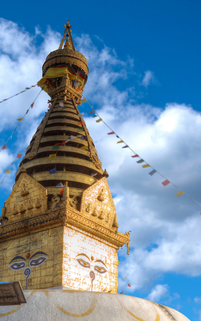 Swayambhunath Stupa with monkeys and blue sky