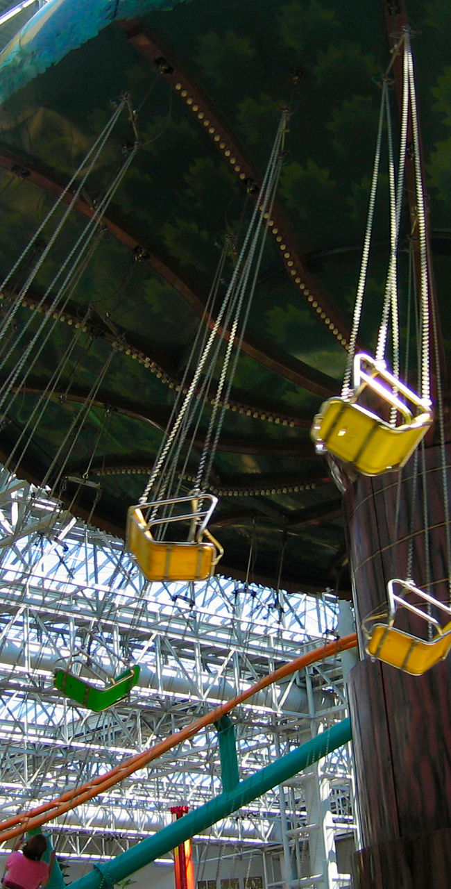 Indoor amusement park swing ride