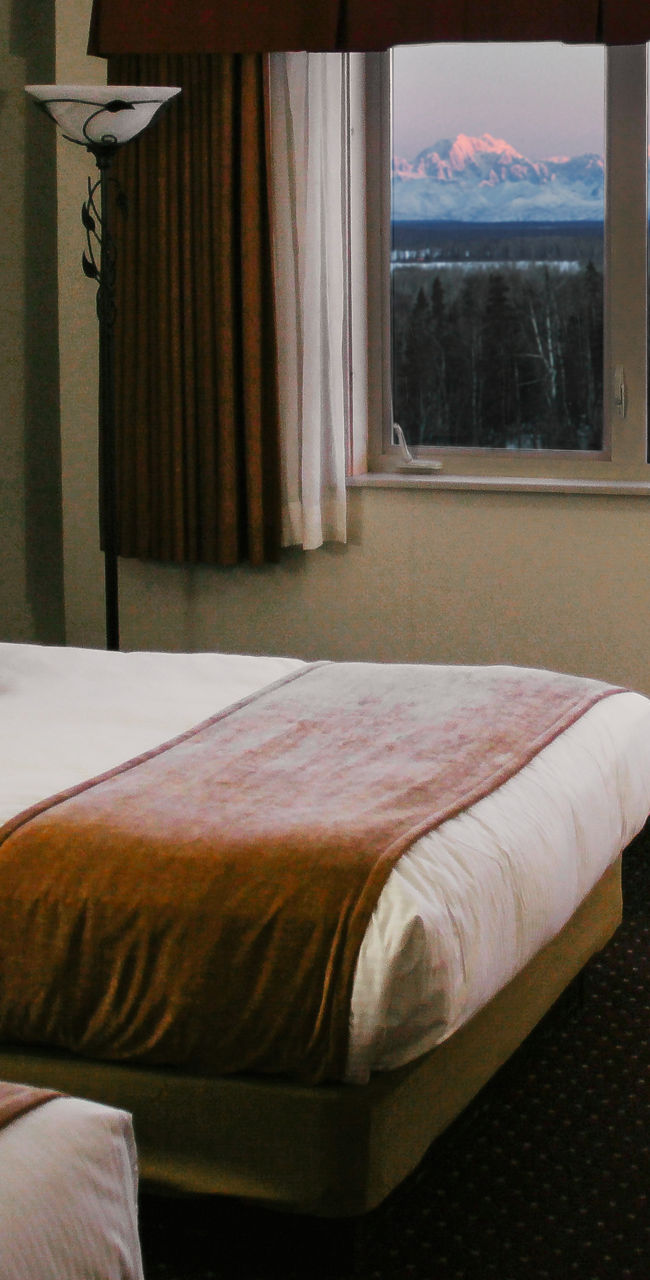 Cozy hotel room with mountain view