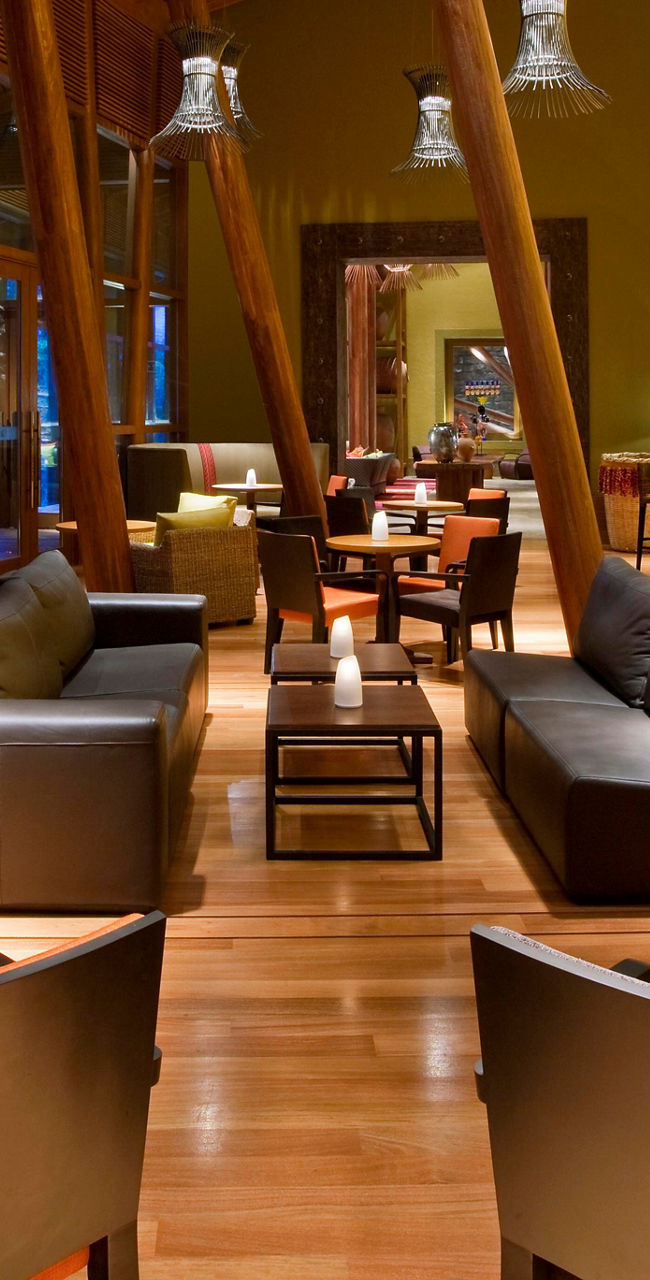 Modern lounge with warm lighting and decor