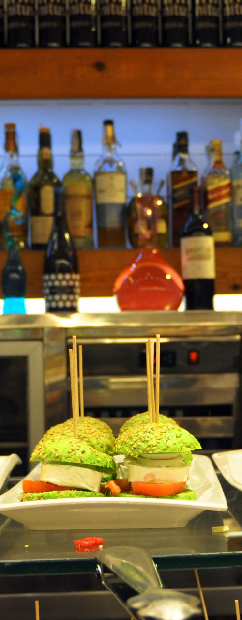 Tapas bar with assorted food and drinks