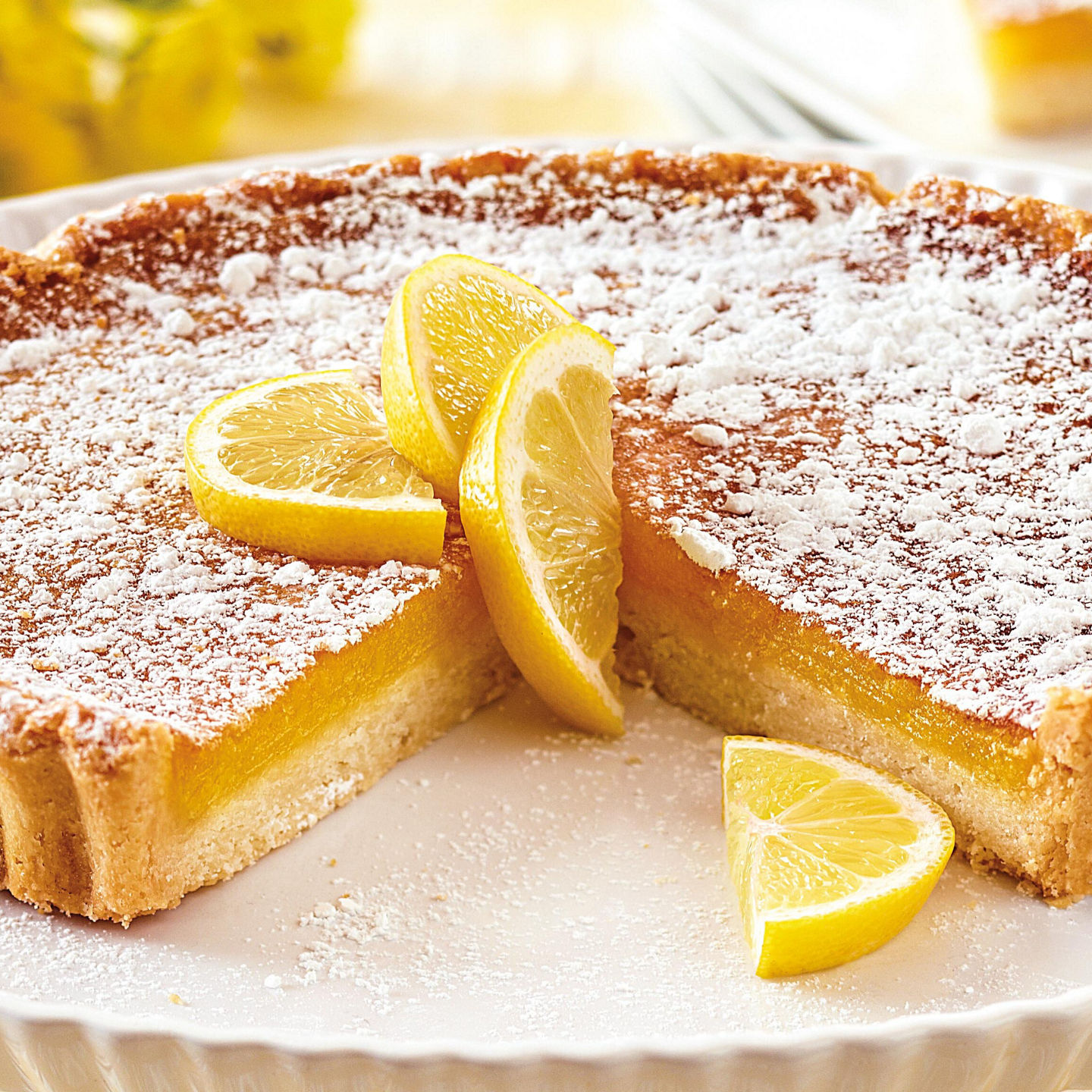 Lemon tart with powdered sugar topping