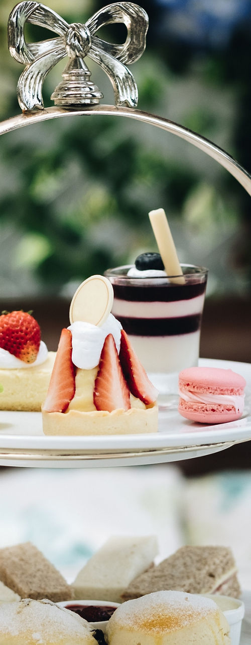 Elegant afternoon tea with desserts