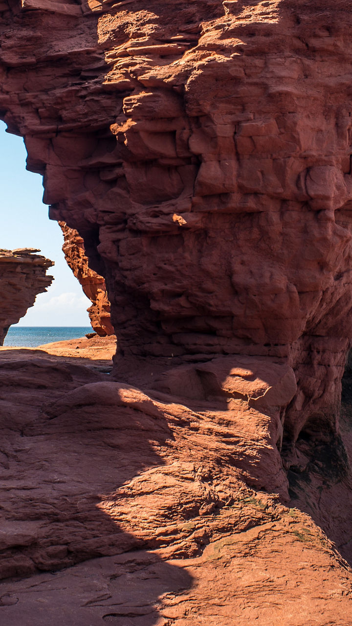 Red sandstone cliffs by the ocean