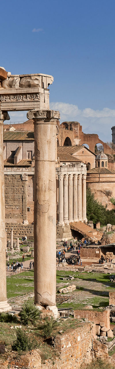 Ancient Roman Forum ruins under blue sky