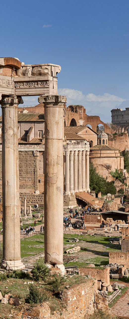 Ancient Roman Forum ruins under blue sky