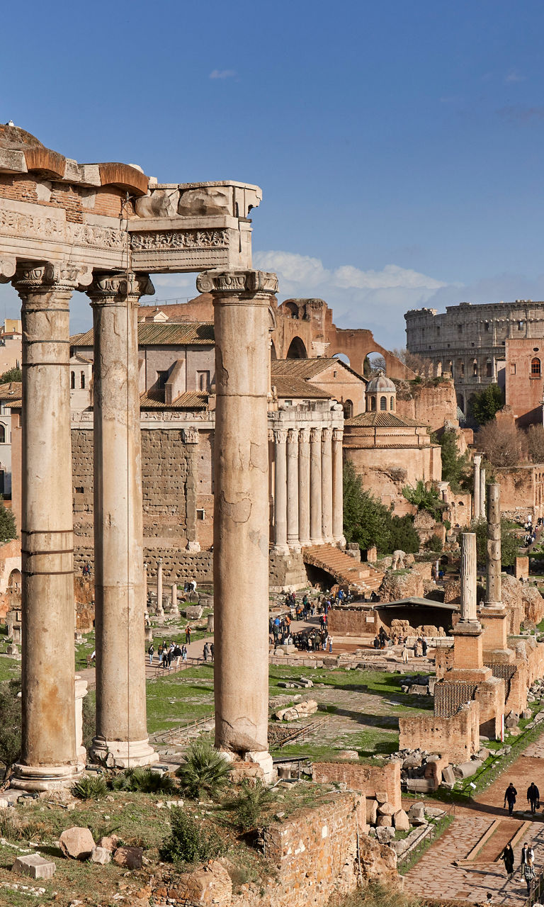 Ancient Roman Forum ruins under blue sky
