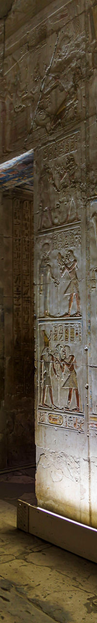 Ancient Egyptian temple interior with hieroglyphs