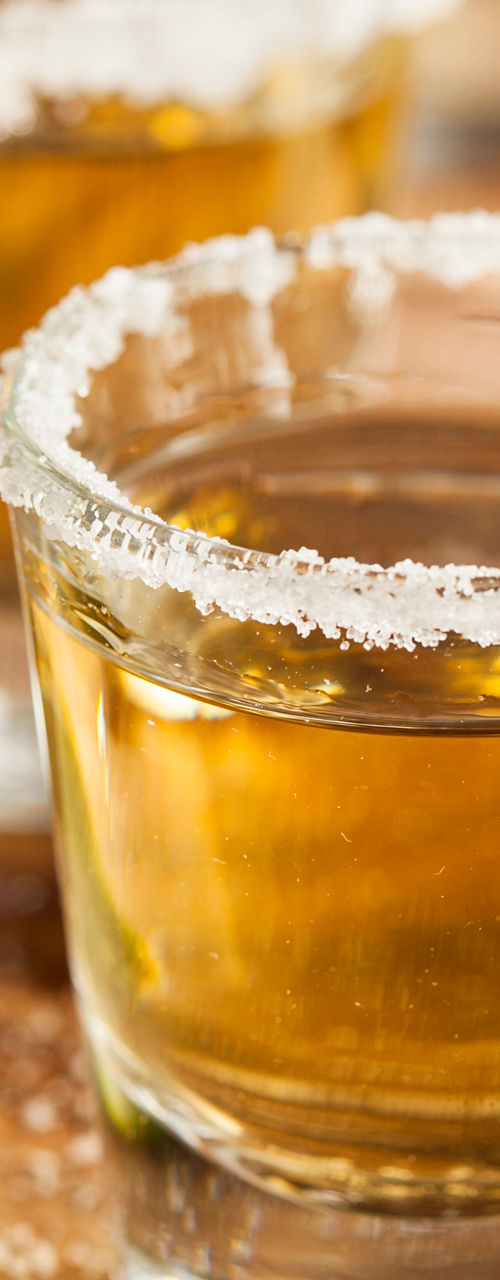 Tequila shots with lime and salt rim