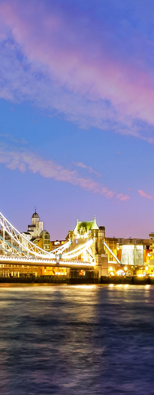 Tower Bridge at sunset with city lights