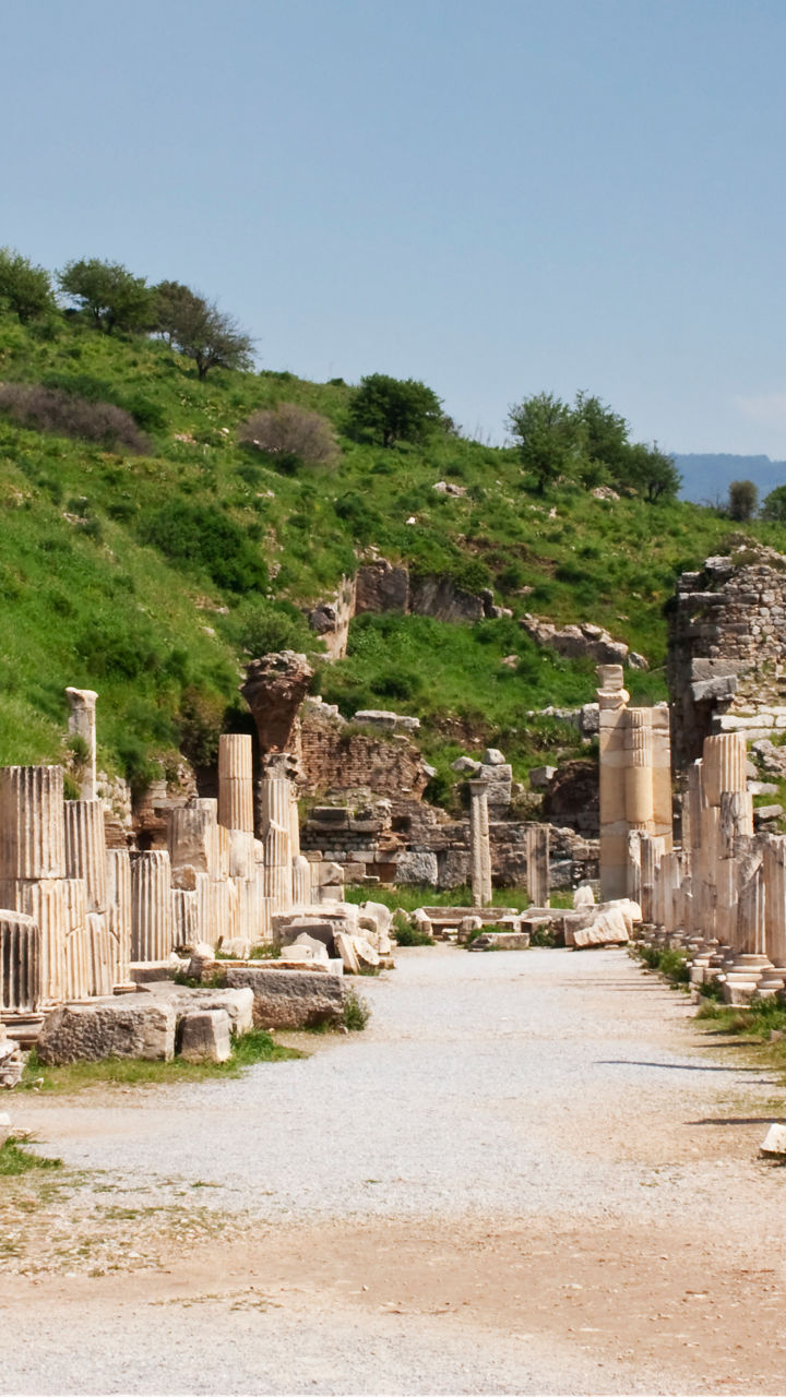 Ancient Roman ruins under clear blue sky