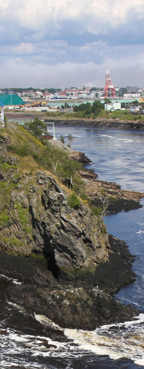 Scenic river view with bridge and cityscape
