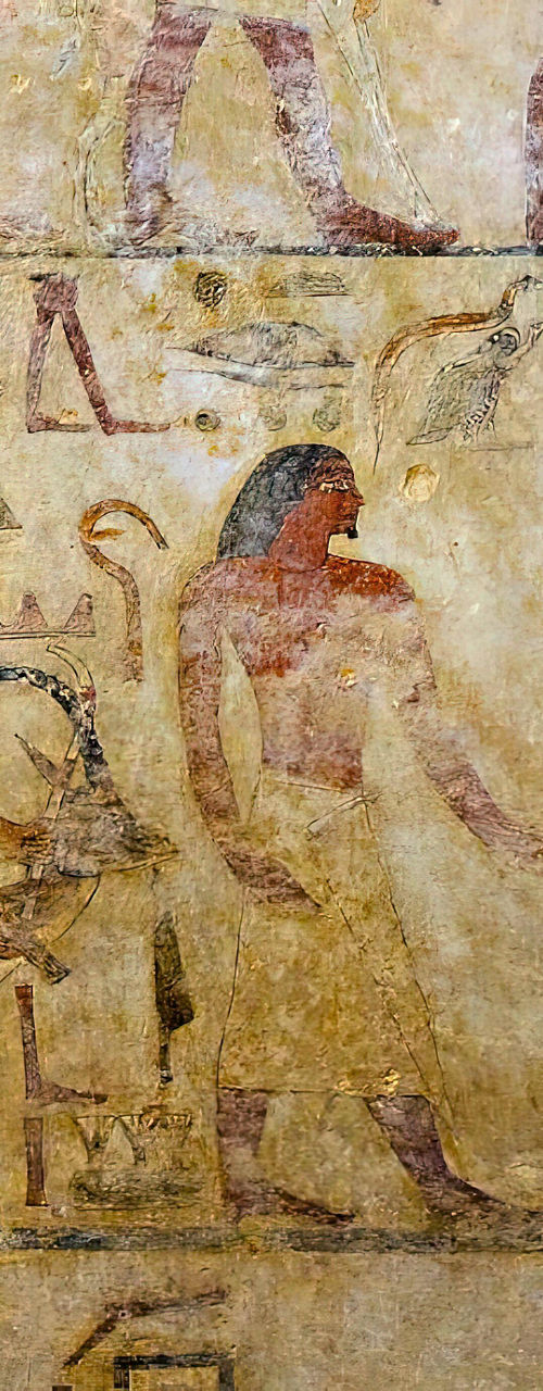 Ancient Egyptian wall painting with figures