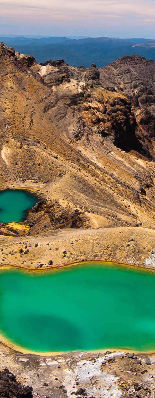 Emerald Lakes in volcanic mountain landscape