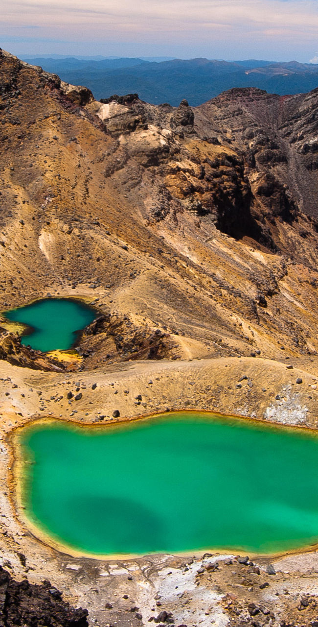 Emerald Lakes in volcanic mountain landscape