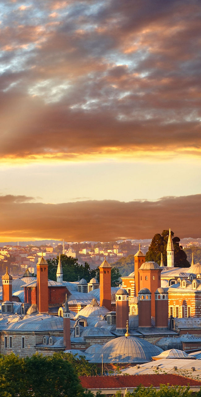 Sunset over Istanbul cityscape with historic landmarks