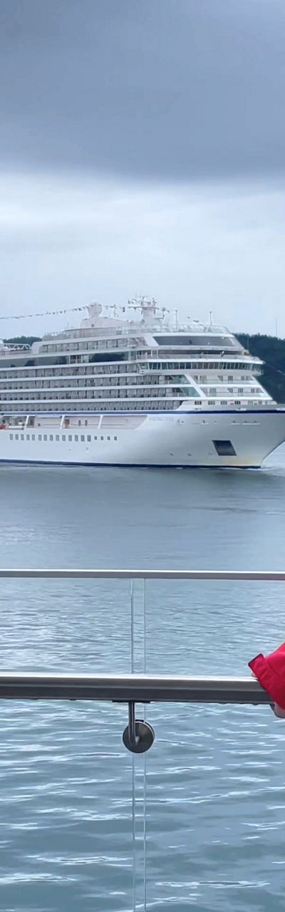 Cruise ship docked near waterfront view
