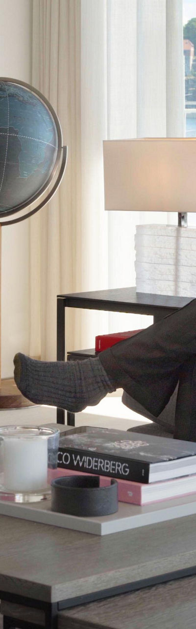 Two men conversing in modern living room