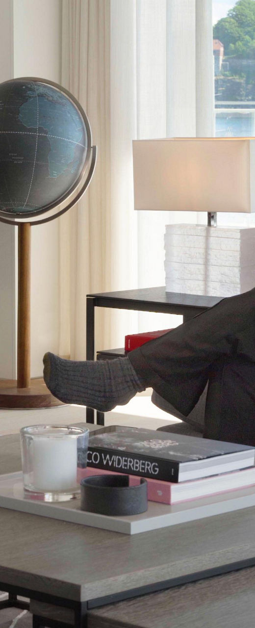 Two men conversing in modern living room