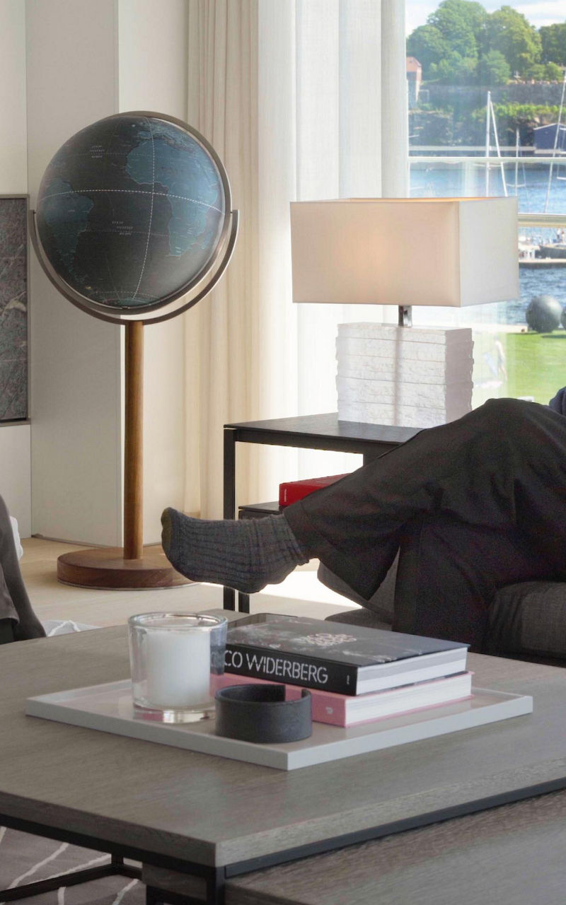 Two men conversing in modern living room