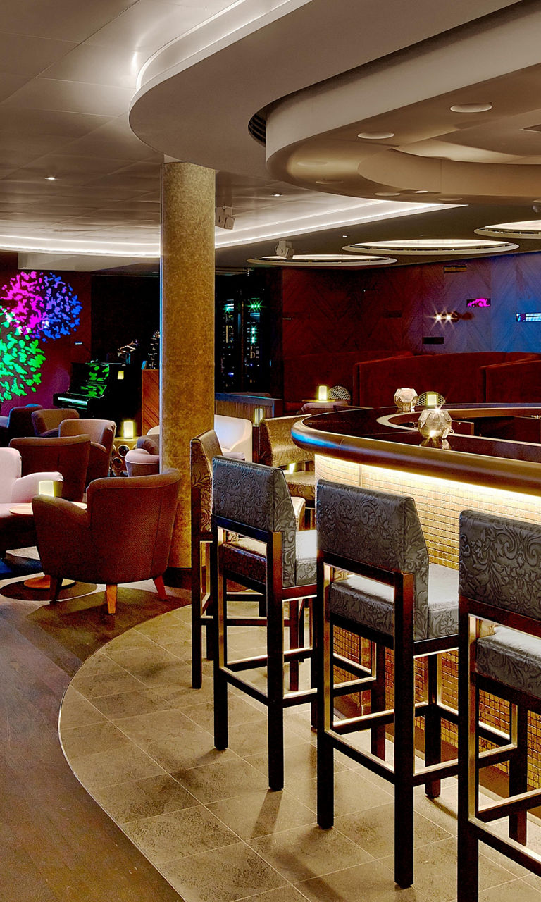 Modern lounge bar with vibrant lighting